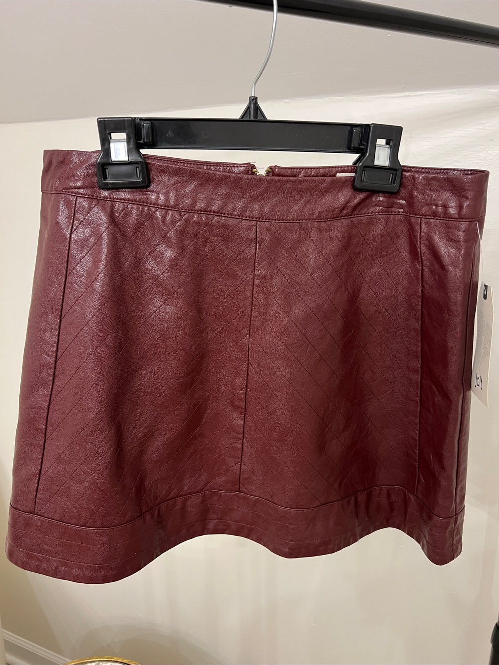 Jolt Quilted Faux Leather Mini Skirt in Wine